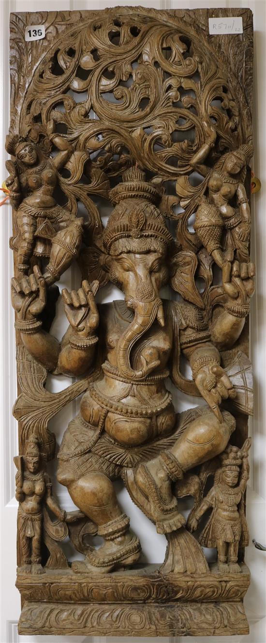 A carving of Ganesh, 20th century width 34cm height 92cm